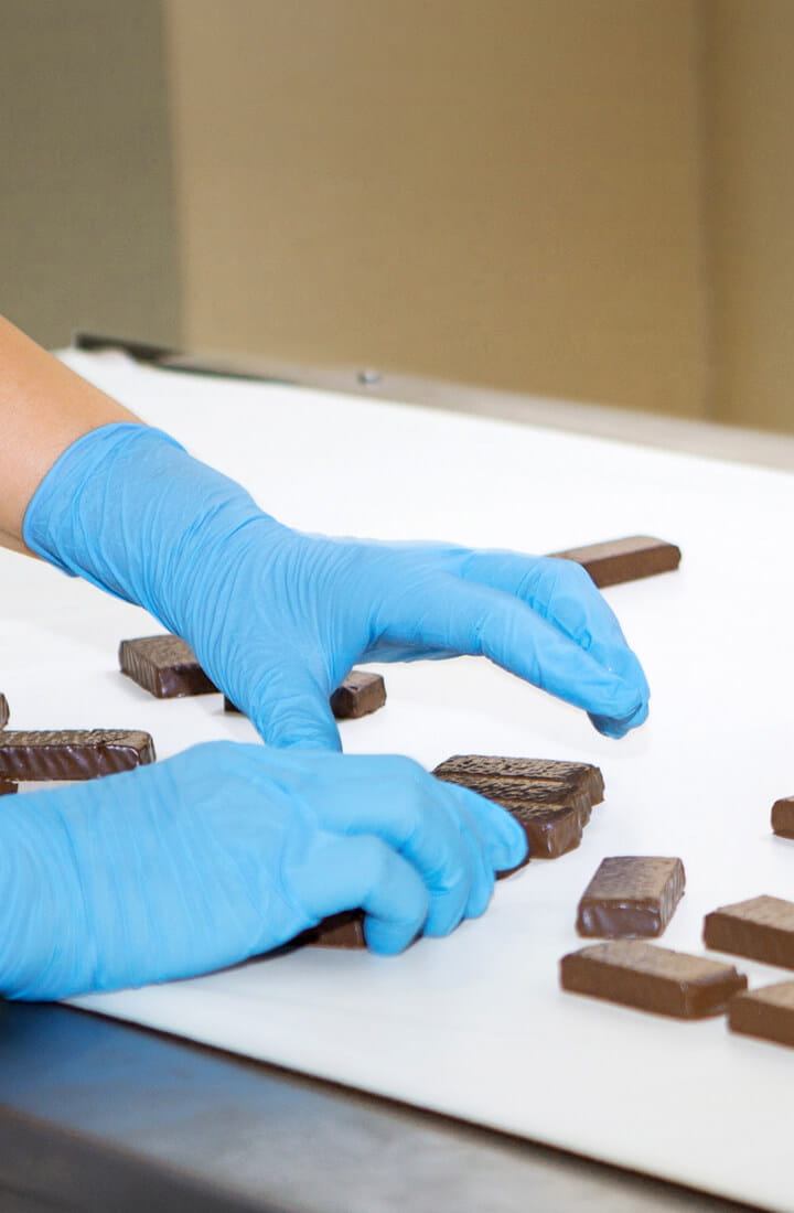 chocolates being arranged in a factory