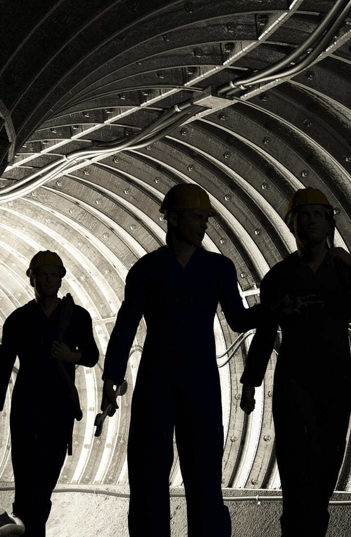 workers walking through tunnel