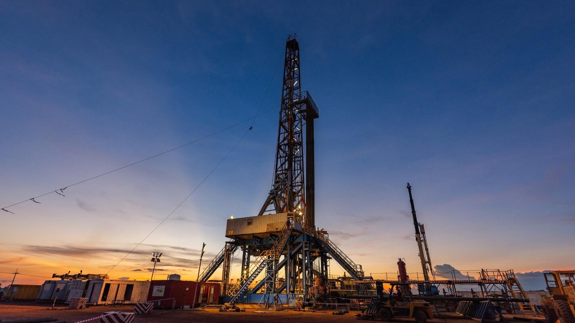 Drilling site and equipment at dusk