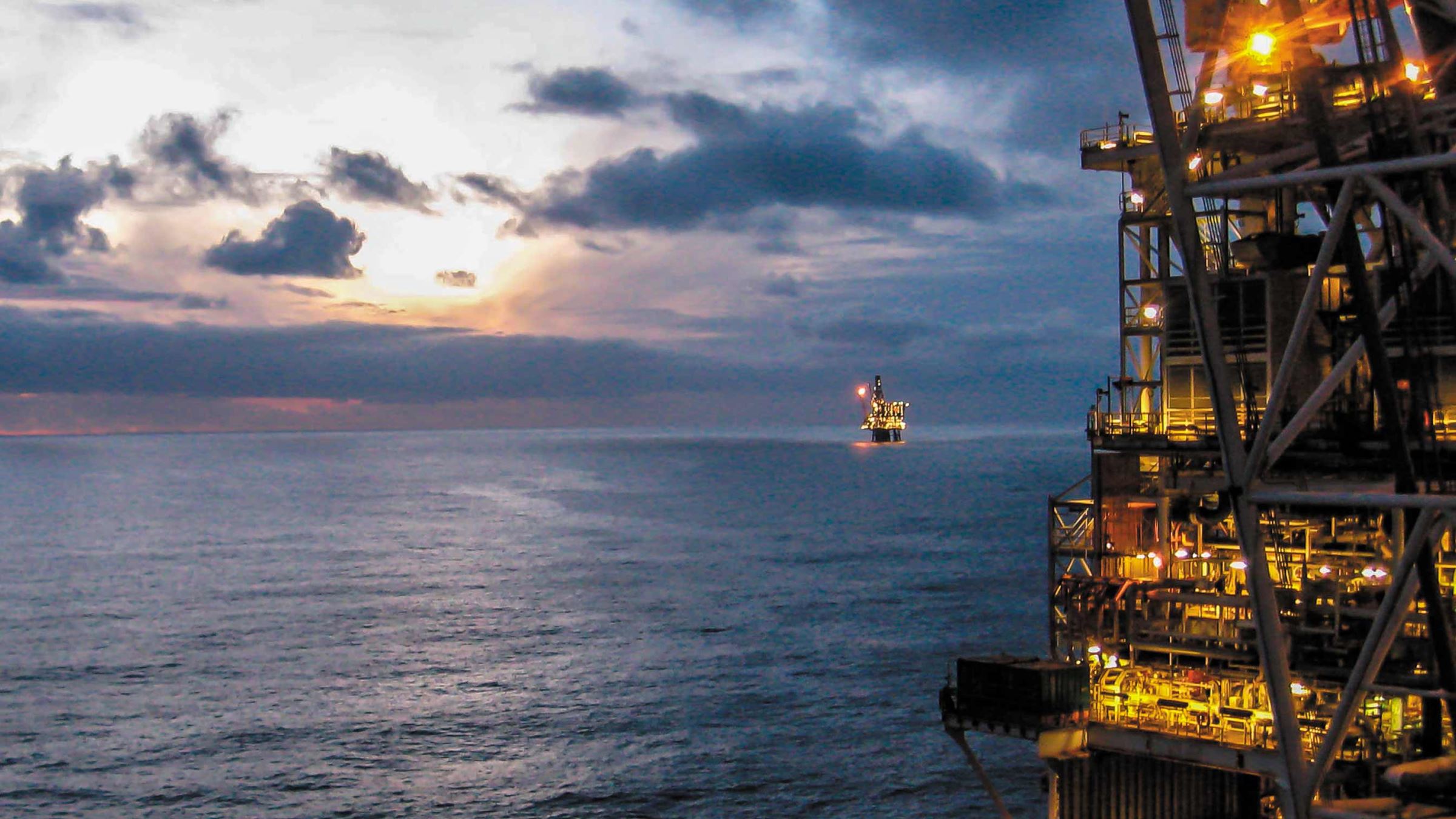 Offshore platform at night, oil and gas
