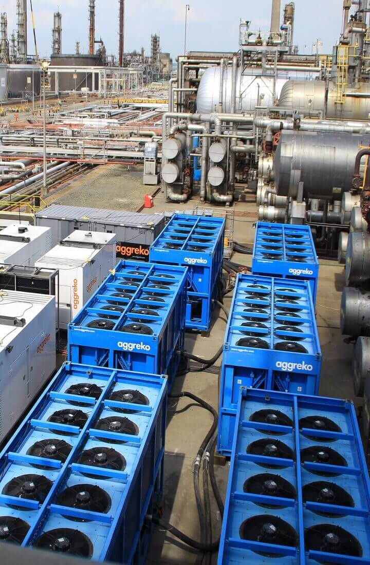 Row of cooling equipment alongside power generators 
