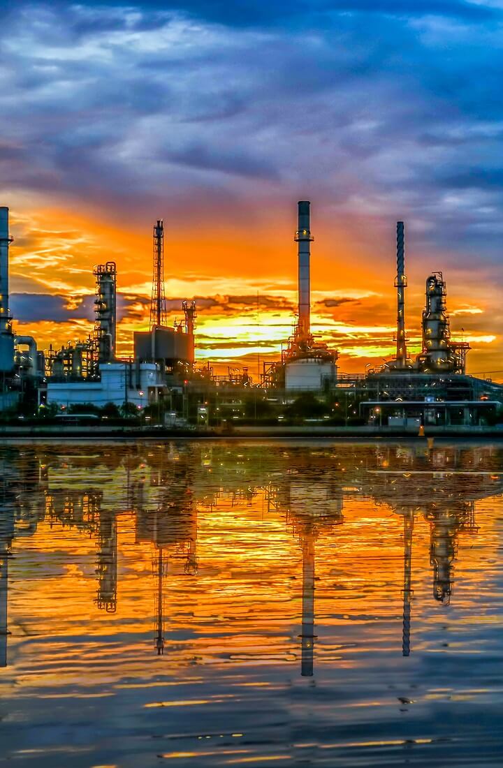 Oil and gas site in sunset