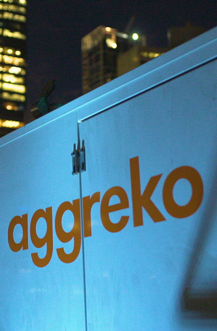 mobile image of Aggreko generator with city backdrop