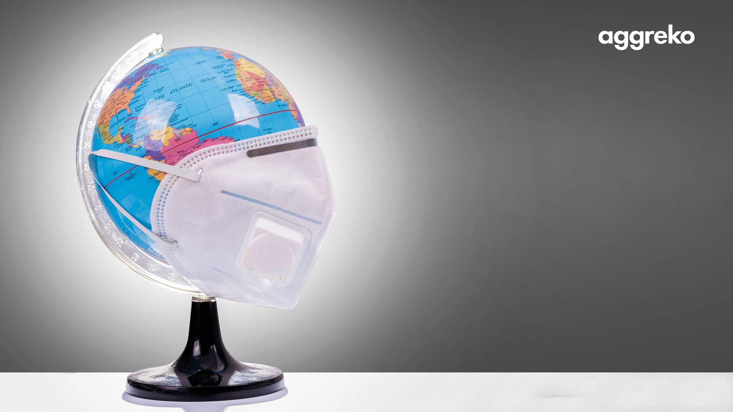 Globe of the world with a surgical mask on