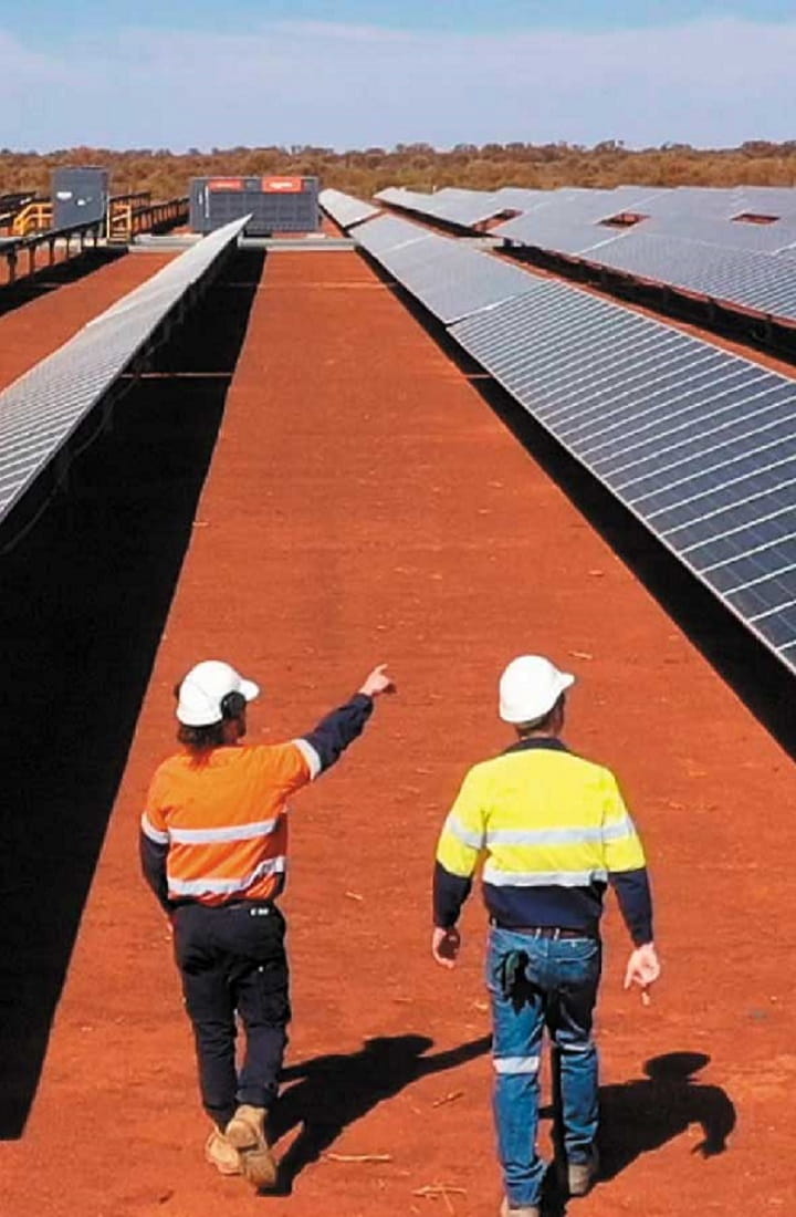 Two Aggreko workers at a solar power plant