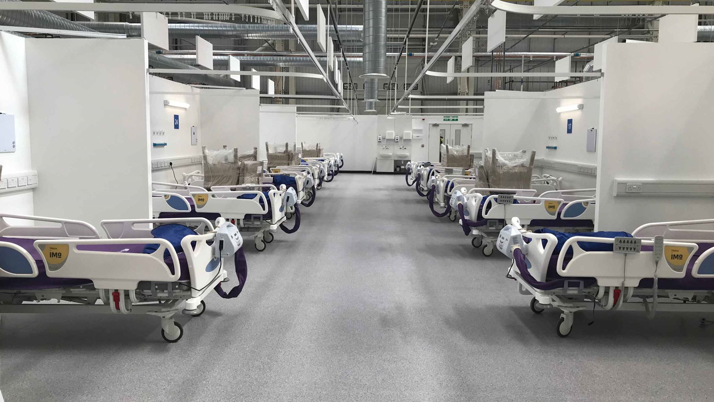 Hospital beds on either side of a room