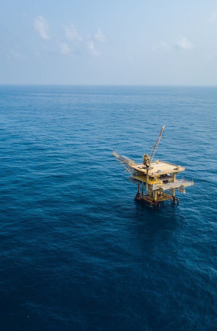 An oil rig in a vast sea of water